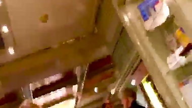 Young girl at buffet with tight leather skirt